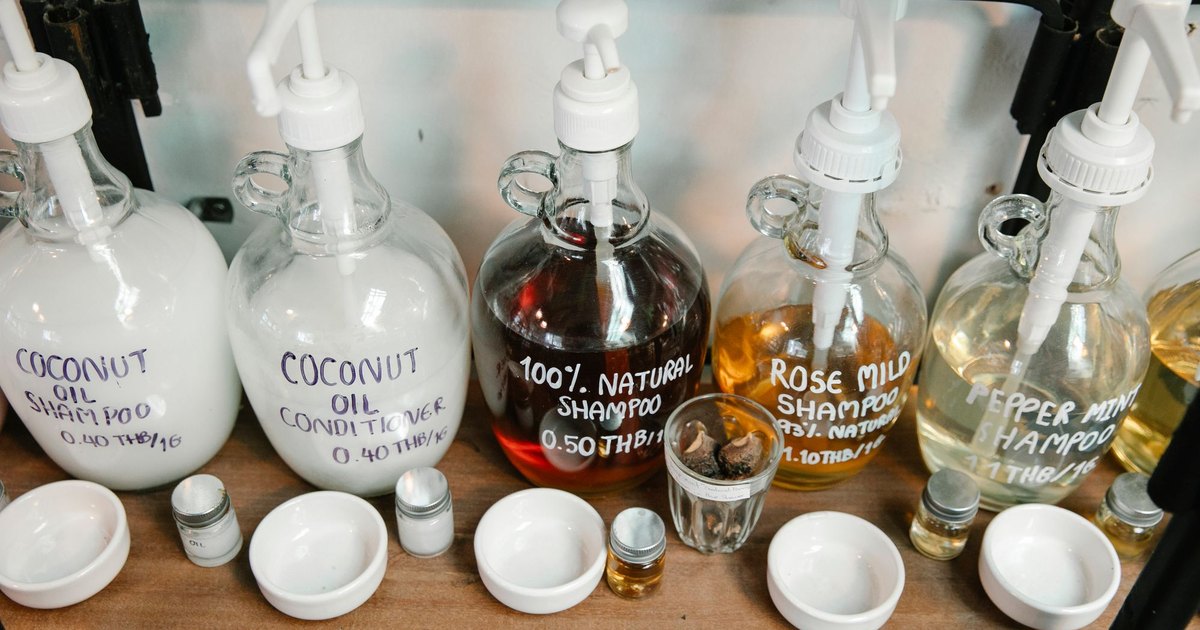 Refillable glass bottles of natural shampoo and conditioner